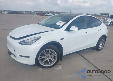 2023 Tesla Model Y Awd/Long Range Dual Motor All-Wheel Drive z USA, uszkodzony, nr VIN 7SAYGDEE9PA097396